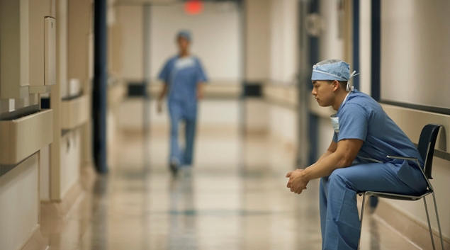 doctor sitting in a hallway