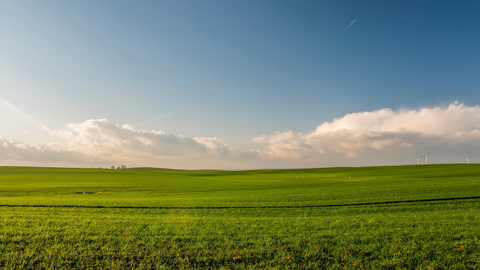 Farm field with clouds