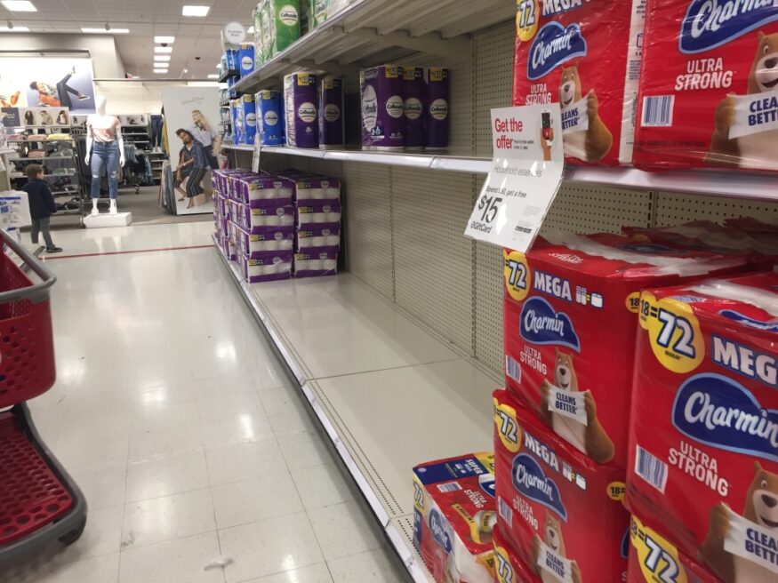 Empty shelves in the toilet paper section